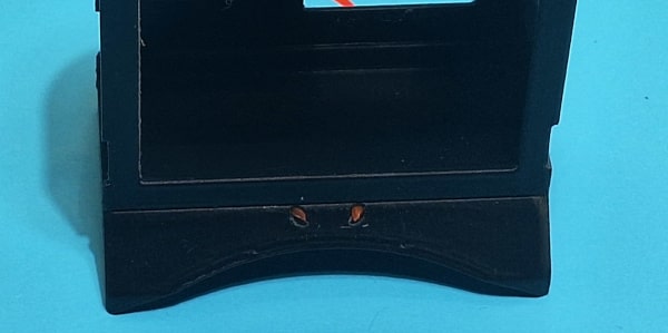 Make sure the string is visible but not protruding out